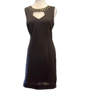Spense black fitted Sz  12 dress with gold toned embellishments around collar